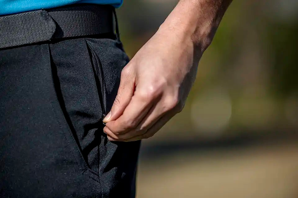 detail shot of mens golf black shorts